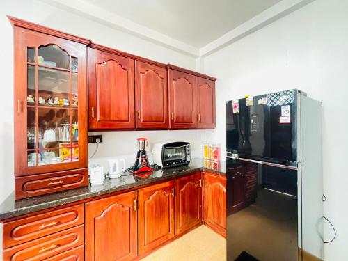 Η κουζίνα ή μικρή κουζίνα στο Amity Villa