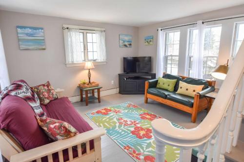 a living room with a couch and a chair at Walk to Restaurants Shopping & Harbor in Wellfleet