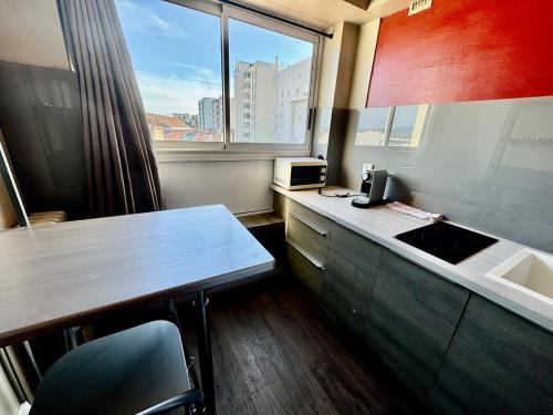 Η κουζίνα ή μικρή κουζίνα στο Hyper Centre de Valence - Grand Studio N54