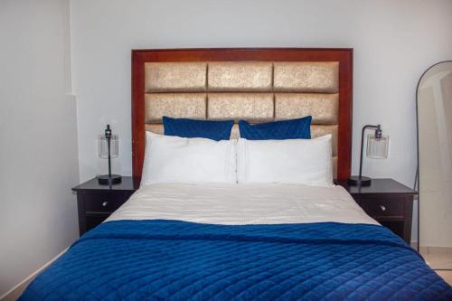 Postel nebo postele na pokoji v ubytování Cosy Nest