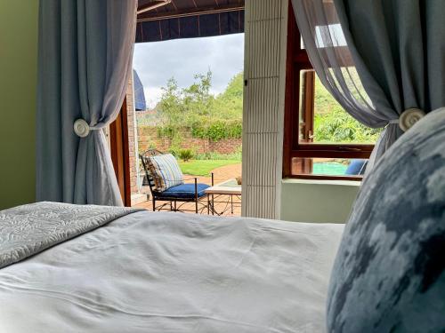 Postel nebo postele na pokoji v ubytování Map's View Guesthouse