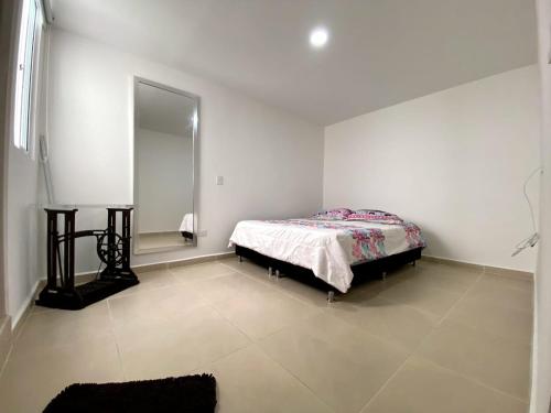 Giường trong phòng chung tại Casa de Paz