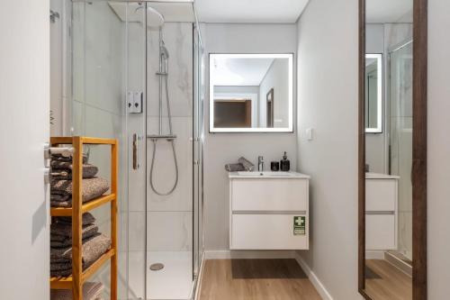 a bathroom with a shower and a sink at Boutique in Funchal