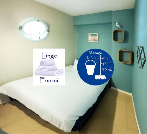 Ένα ή περισσότερα κρεβάτια σε δωμάτιο στο Marines et Salorges - Les Gîtes de la Côte d'Amour