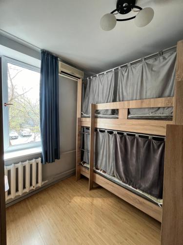 Postel nebo postele na pokoji v ubytování Hostel64