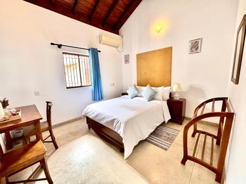 Ένα ή περισσότερα κρεβάτια σε δωμάτιο στο Nest Villas