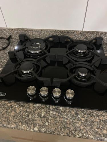 Η κουζίνα ή μικρή κουζίνα στο Sarahsiripi Apartment