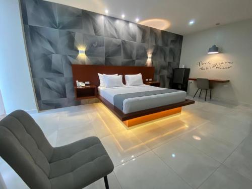 Llit o llits en una habitació de HOTEL OSHO