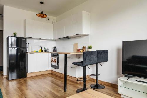 Η κουζίνα ή μικρή κουζίνα στο Apartment Moderna