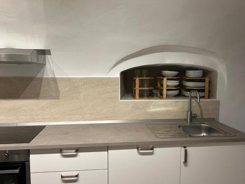 Kuchyň nebo kuchyňský kout v ubytování Il Borgo di Tresana Casa Marina