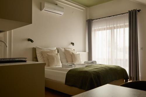 Кровать или кровати в номере Stodoła U Gajdy