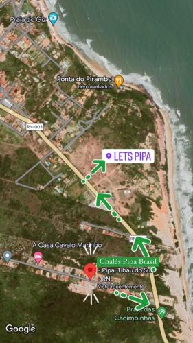 a map of a beach next to the water at Chalés Pipa Brasil in Pipa