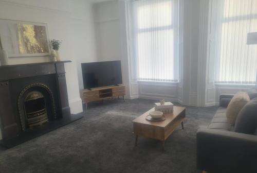 Et tv og/eller underholdning på Modern one bed close to city