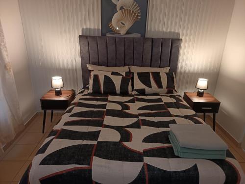 En eller flere senge i et værelse på Queens Gardens