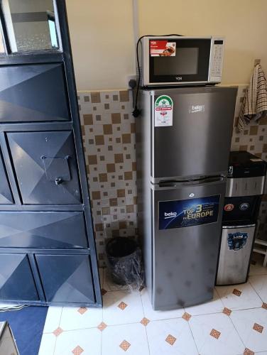 Η κουζίνα ή μικρή κουζίνα στο AMEROD BNBs