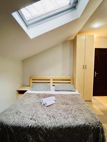 Ένα ή περισσότερα κρεβάτια σε δωμάτιο στο Studio Centru