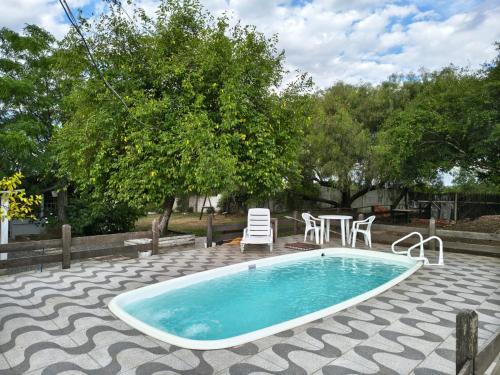 Πισίνα στο ή κοντά στο Pousada Espírito Santo - Estamos ubicados a solo 100 metros de la Ruta BR-290