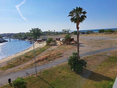 Amoureva B35, T2 vue mer, parking, piscine, clim