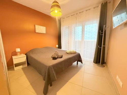 En eller flere senge i et værelse på Iconic T3 - Parking - Wifi - Vue mer et Montagne