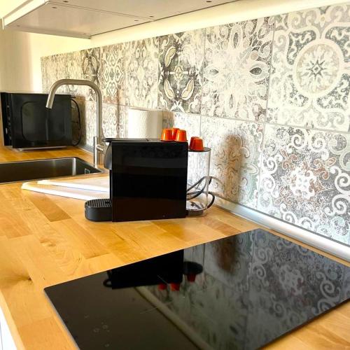 Η κουζίνα ή μικρή κουζίνα στο Großzügige FeWo mit Bergblick am Tegernsee