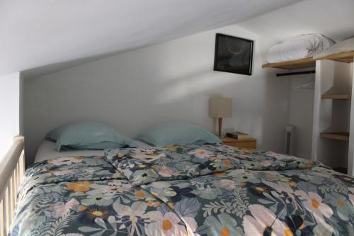 En eller flere senge i et værelse på Appartement avec vue exceptionnelle