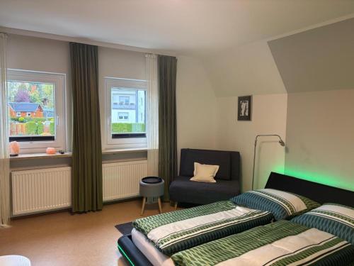 Postel nebo postele na pokoji v ubytování Villa Sonnenschein im Zentrum Bad Stebens nahe der Therme