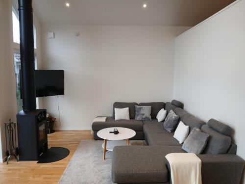 Et opholdsområde på Exklusivt hus med sjöutsikt