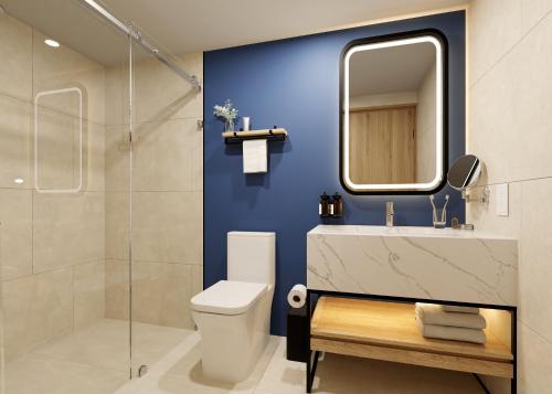 Phòng tắm tại voco Surfside Aruba by IHG