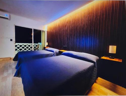 Postel nebo postele na pokoji v ubytování Suite Luna