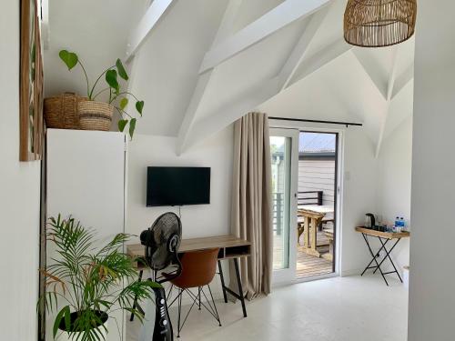 Телевизор и/или развлекательный центр в Imhoff's Sweet Escape