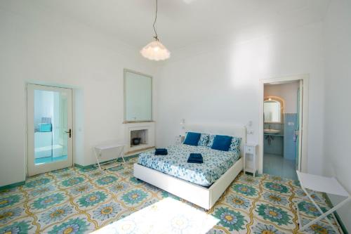 En eller flere senge i et værelse på Maison Turquoise sea view - Amalfi Coast