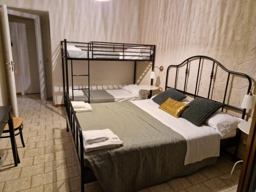 Postel nebo postele na pokoji v ubytování Hotel ambra milano