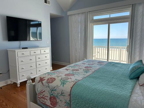 Postel nebo postele na pokoji v ubytování Captain's Choice