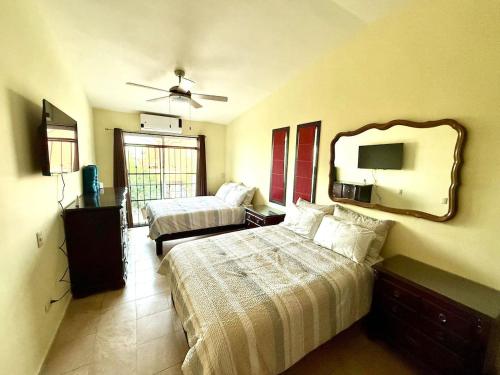 Postel nebo postele na pokoji v ubytování Villa Alberca, Bar y Terraza Privada