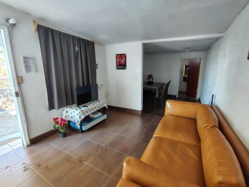 Et opholdsområde på Casa Nostalgia Tree, Patio and Vintage Touch