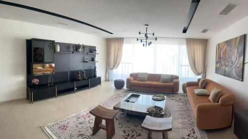 Μια τηλεόραση ή/και κέντρο ψυχαγωγίας στο Résidence SIKI Prestige