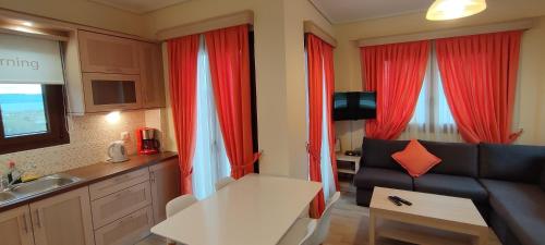 TV a/nebo společenská místnost v ubytování Agnanti Houses