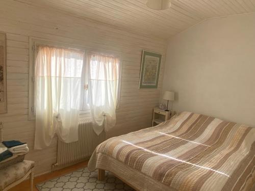 Giường trong phòng chung tại PLIM CIE 2 chambres, sde à l'étage