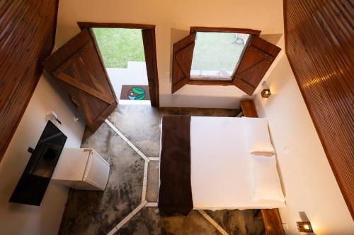 an overhead view of a room with two windows at Tekoha Eco Hotel in Bonito