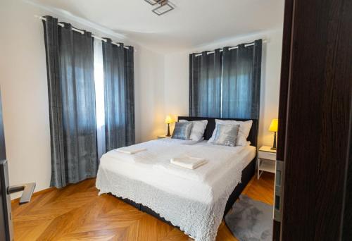 En eller flere senge i et værelse på Magic Pine