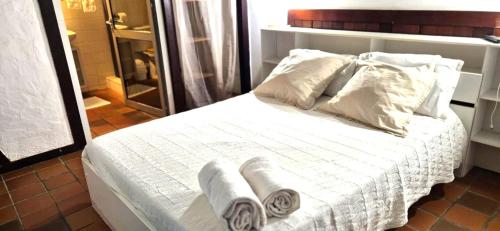 En eller flere senge i et værelse på Bungalow Nature Plage Surf Helleux