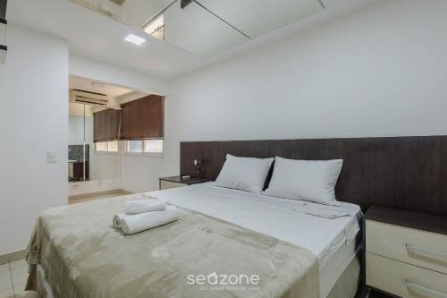 En eller flere senge i et værelse på Apto c/ Churrasqueira e Jacuzzi CCG1403