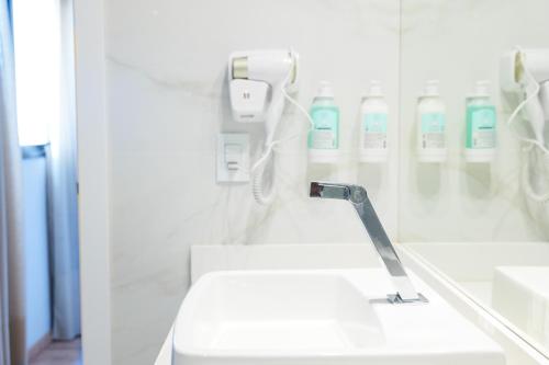 Koupelna v ubytování Clatt Hotel