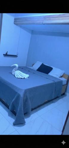 En eller flere senge i et værelse på Quartos House Family