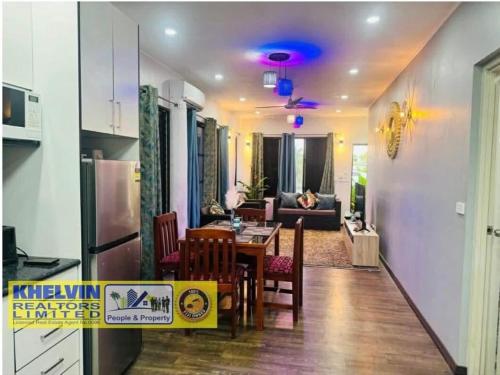 אזור ישיבה ב-Villa Up Your Holiday