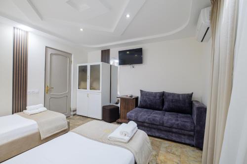 Voodi või voodid majutusasutuse Time Hotel toas