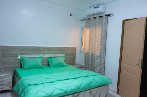 Giường trong phòng chung tại Top luxe