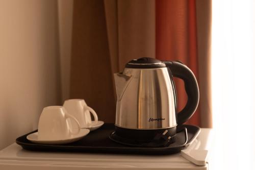 Facilități de preparat ceai și cafea la Time Hotel