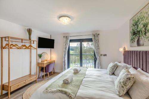 Ένα ή περισσότερα κρεβάτια σε δωμάτιο στο 4 Bed in Berriew oc-t31114