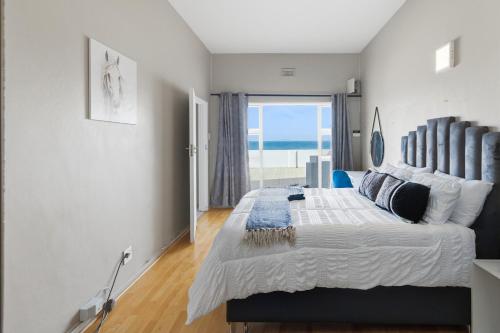 En eller flere senge i et værelse på Olive Villa with Sea View